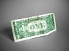 Dollar bill standing on edge