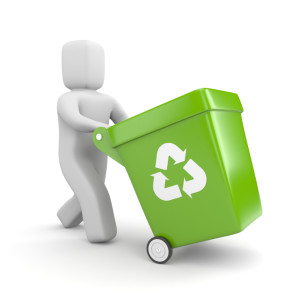 Person with green recycling bin