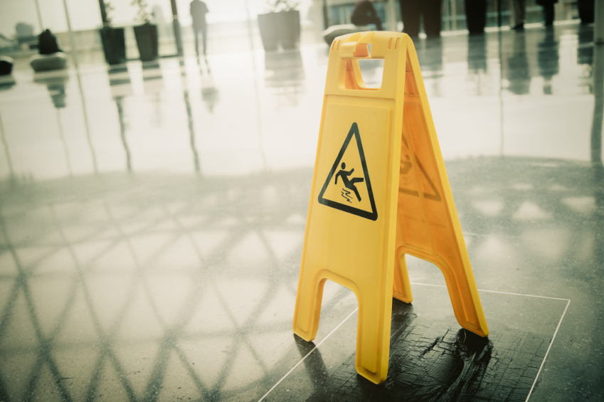 Safety sign on wet floor - don't slip!