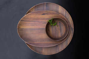 Wood patterned melamine plates stacked on table