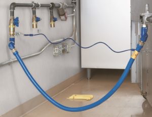 Blue gas hose connected to appliance