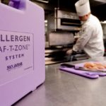 Purple food allergy kit with Chef in background