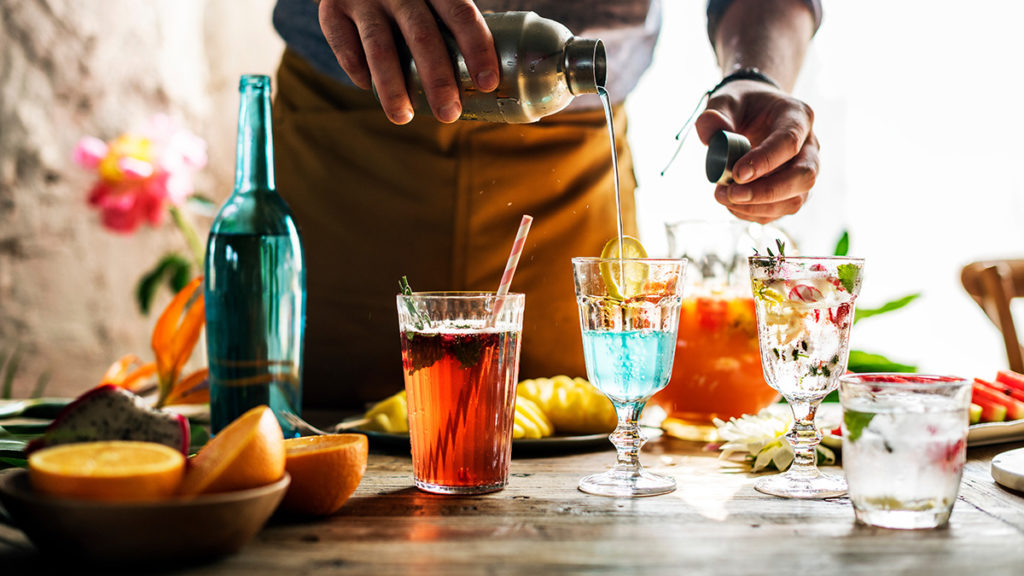 Man pouring summer cocktail