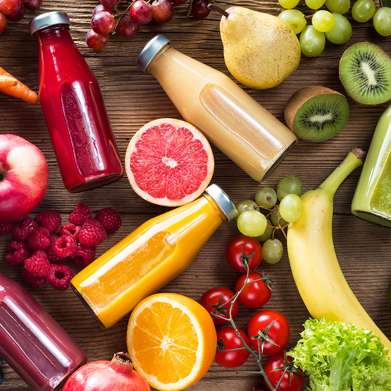 Looking down at a table of assorted fruit and fruit juices. 
Three Timesaving Products We’re Thankful For
