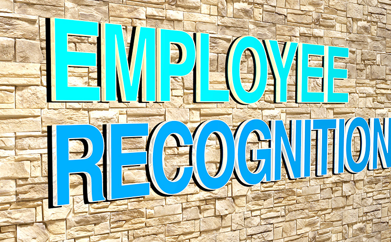 Employee Recognition sign with blue lettering 